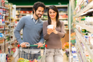 42245882 - young couple shopping in a supermarket